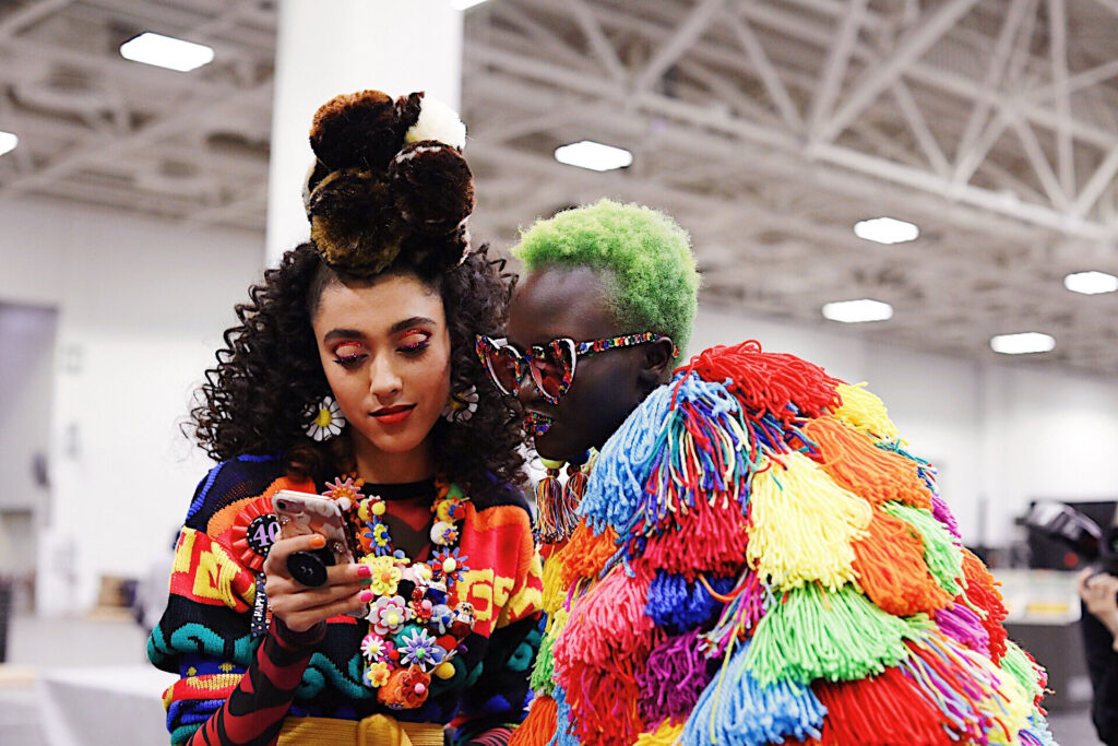 Hair Stylist School in Maryland two Stylists with colorful clothing
